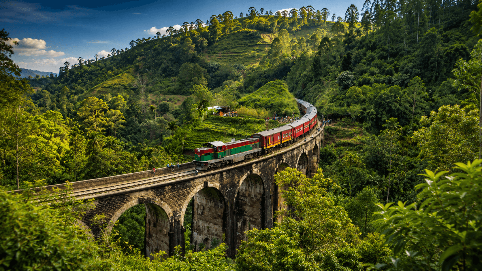 Scenic train journey crossing a stone bridge through Sri Lanka's lush highlands