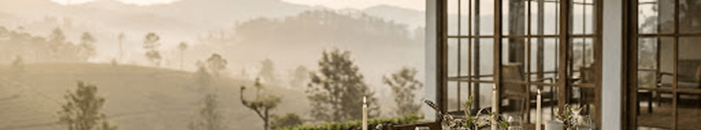 Terrace dining overlooking misty hills at a luxury Sri Lankan property