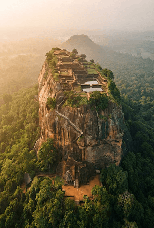 Aerial view of Sigiriya rock fortress above the jungle canopy